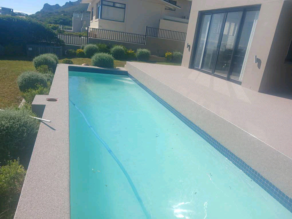 Quartz carpet pool surround installation